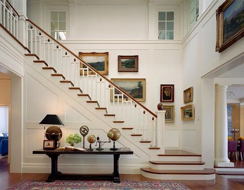 Design with an Art Lover in Mind: http://www.deringhall.com/daily-features/contributors/dering-hall/design-with-an-art-lover-in-mind Staircase Molding, Stairs Trim, Wood Floor Design, Contemporary Stairs, Craftsman Style Home, Dark Wood Floors, Chair Rail, Railing Design, Staircase Design