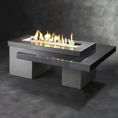 The Outdoor GreatRoom Company Uptown 64-Inch Linear Propane Gas Fire Pit Table with 42-Inch Crystal Fire Burner - Black - UPT-1242. UPT-1242. Fire Pit Tables. Add a modern style to your home with this Uptown Fire Pit Table from The Outdoor GreatRoom Company. The Uptown is designed with clean, simple lines, and engineered to showcase a stunning glowing fire that is sure to heat up your outdoor space. This fire pit table features a unique tiered table design with a porcelain tiled lower tier, an o Fire Pit Lighting, Natural Gas Fire Pit, Outdoor Fire Pit Designs, Modern Fire Pit, Fire Pit Ring, Propane Fire Pit Table, Gas Fire Pit Table, Gas Fire Pit, Fire Pit Designs