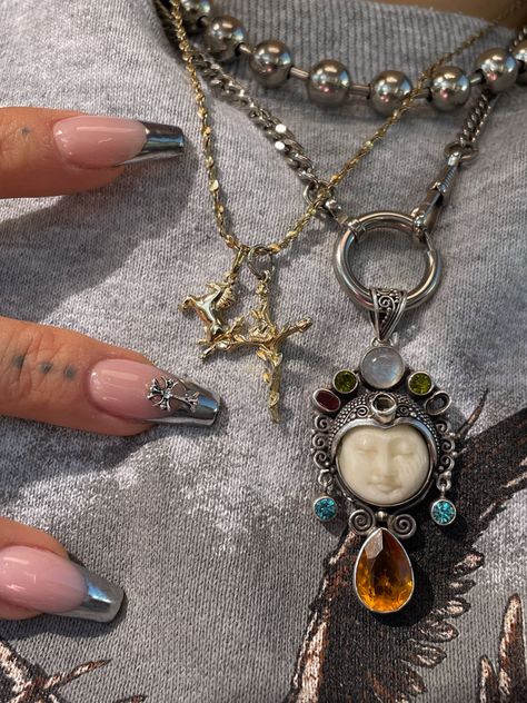 Cute chrome nails with layers of necklaces Mixing Jewelry Metals Style, Maximalist Necklace Layering, Chunky Mixed Metal Jewelry, Mixed Jewelry Aesthetic, Silver And Gold Jewelry Mixing Aesthetic, Mixed Metals Necklace Layering, Chunky Necklace Stack, Silver And Gold Necklace Layering, Maximalist Silver Jewelry