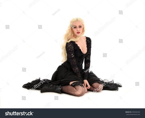 beautiful blonde woman wearing a long black gothic gown, sitting on the ground. isolated on white background. On The Ground Reference, Dress Drawing Reference Sitting, Sitting On Floor Aesthetic, Sitting In Long Dress Reference, Person Sitting On Ground Reference, Sitting On The Ground Pose Reference, Sitting Ground Pose, Kneeling On Floor Pose, Woman Sitting On Floor Reference