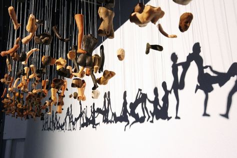 Provocative Shadow Art Created Through Suspended Doll Parts - Unity is a suspended installation by Korean artist Bohyun Yoon that takes fragmented pieces of dolls and transforms them into a line of people in suggestive poses. Source: My Modern Metropolis Suspended Installation, Sculptures Abstract, Chainsaw Carvings, Graffiti Artists, James Turrell, Olafur Eliasson, Metal Sculptures, Kunst Inspiration, Art Light