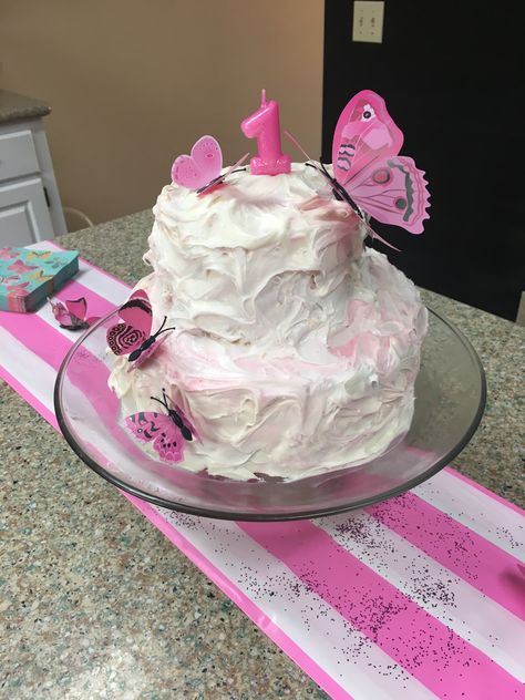 Two boxes of cake mix, three cans of icing: one pink, two white, fake butter flies .. I made two small circle cakes and two large circle cakes. Added a lil sugar to tops before baking so the cake wouldn't rise all crazy.. I used the pink icing for the filling and when I started to icing the top I simply dragged some of the pink around to get the double color swirls. Just kinda went messy with the icing while spinning the cake plate. Finished up with my butterflies for the last touch! Circle Cake, Pink Icing, Color Swirl, Small Circle, Cake Plate, Cake Plates, The Pink, Spinning, Butterflies