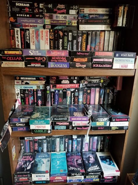 VHS horror movies. A portion of my personal collection. Vhs Collection Display, Vhs Display, Horror Movie Collection, Vhs Collection, 90s Room, Horror Vhs, Movie Theater Rooms, Store Aesthetic, Physical Media