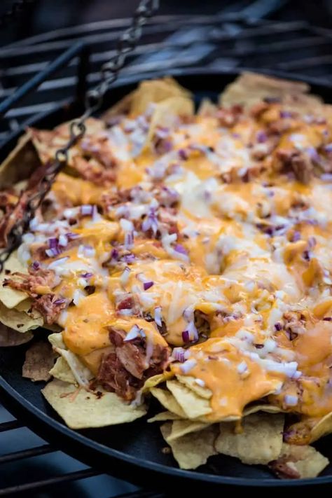 Loaded campfire nachos, with shredded chicken and hummus, are a cheesy delicious camping meal everyone will love. Easy recipe with all the best toppings! #adventuresofmel #campfirefood #campingrecipes #nachos #campingmeals Nachos With Chicken, Chicken And Hummus, Campfire Nachos, Campfire Cooking Equipment, Easy Campfire Meals, Campfire Meals, Camping Cooking Gear, Camping Meal, Dutch Oven Recipes