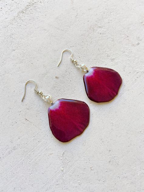 Handmade earrings made from a print of real dried and pressed rose petals.  These high-quality replicas look like real rose petals but are even better because their color won't fade! The colors of real dried flowers fade within a few years. These are printed with quality fade-resistant ink and high resolution to look exactly like the real petals but not fade so you can enjoy your jewelry for longer.   If bought together, the full and partial rose petal earrings make a lovely mother/daughter earr Pressed Rose Petals, Rose Earring, Flower Jewelry Designs, Roses Gift, Real Rose Petals, Petal Earrings, Real Flower Jewelry, Flower Earring, Burgundy Flowers