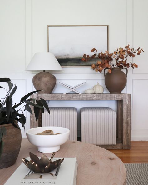 Fall console table decor - the only thing I changed here were the stems and the swapped a candle for the pumpkins 🍂 🍂visit the link in bio to shop this space Have a wonderful day! . . Fall decor, seasonal home decor, fall stems, console table decor, pottery barn home, McGee and co, target home Fall Console Table Decor, Fall Inspired Living Room, Simple Console Table, Console Table Decor, Living Room Refresh, Living Room Console Table, Round Nesting Coffee Tables, Mcgee And Co, Console Table Decorating