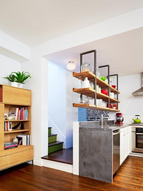 8 Reasons You Should Try Open Shelving in Your Kitchen >> http://www.hgtv.com/design-blog/design/8-reasons-you-should-try-open-shelving-in-your-kitchen?soc=pinterest Kitchens Without Upper Cabinets, Kitchen Bookshelf, Small Kitchen Island, Kitchen Open, Open Kitchen Shelves, Regal Design, Smart Kitchen, Chic Kitchen, Upper Cabinets