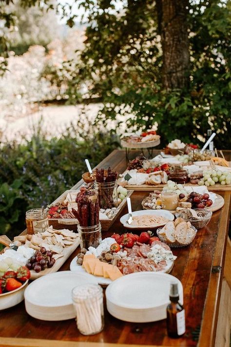 15 Creative And Unique Wedding Food Bar Ideas - (Check out #5) Farmhouse Wedding Food Table, Simple Wedding Grazing Table, Boho Party Food Table, Boho Appetizer Table, Food Corner Wedding, Boho Chic Buffet Table, Snack Wedding Reception, Wedding Table Snacks Receptions, Boho Wedding Food Ideas