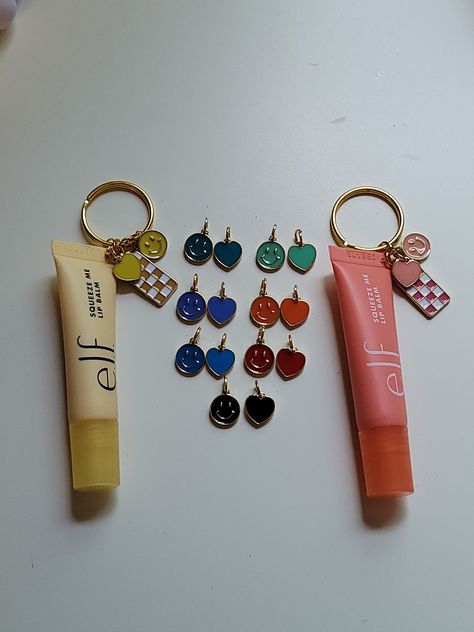 This listing is for 1 e.l.f. lipgloss (or comparable brand) with charms on a keyring to easily attach to your lanyard. charm Colors and lip gloss sent are chosen at random  This listing is final sale due to the nature of the product, no returns or exchanges. Lip Gloss Charms, Chapstick Charms, Lipgloss Charms, Lip Gloss Keychain, Lipgloss Keychain, Craft Nights, Keychain Aesthetic, Fun Packaging, Diy Lip Gloss