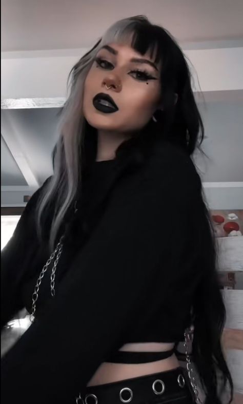 Long goth hair. Black hair with split bangs Black And Silver Split Dye, Black Hair White Streak Bangs, Black And Silver Hair With Bangs, Black Hair And Blonde Bangs, Goth Hair With Bangs, Goth Bangs Long Hair, Black Hair Colored Bangs, Black Hair Money Piece Bangs, Black And White Hair With Bangs