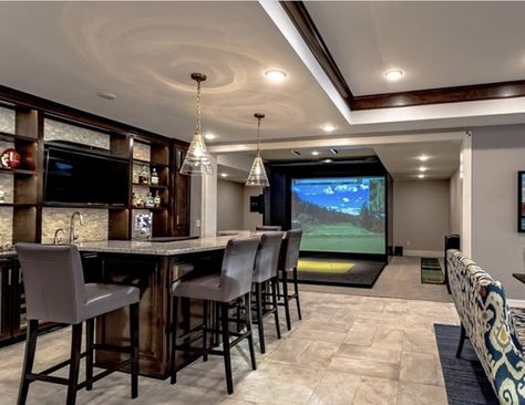 Game Room With Golf Simulator, Golf Basement Man Cave, Golf Simulator Room With Bar, Basement With Golf Simulator, Golf Simulator Man Cave, Man Cave Golf Simulator, Indoor Golf Simulator Man Cave, Basement Golf Simulator Room, Man Cave With Golf Simulator