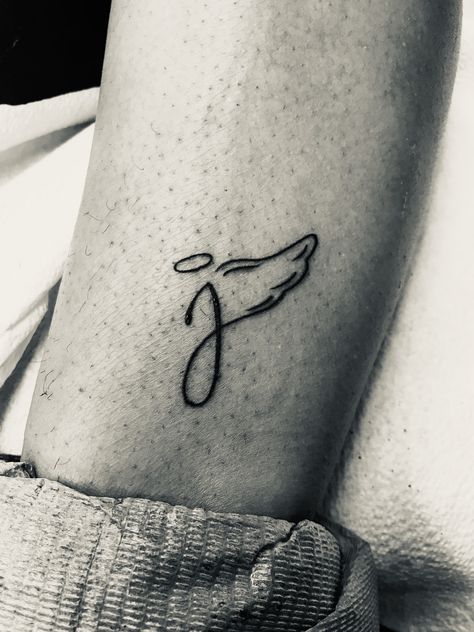 J with angel wings #smalltattooideas #meaningfultattoos #smalltattoosforwomen Small Angel Wing Memorial Tattoo, J Memorial Tattoo, J With Angel Wings Tattoo, J Angel Wing Tattoo, J With Wings Tattoo, Angel Halo Tattoo Ideas, In Memoriam Tattoo, Small Tribute Tattoos, Small Angel Wing Tattoos For Women