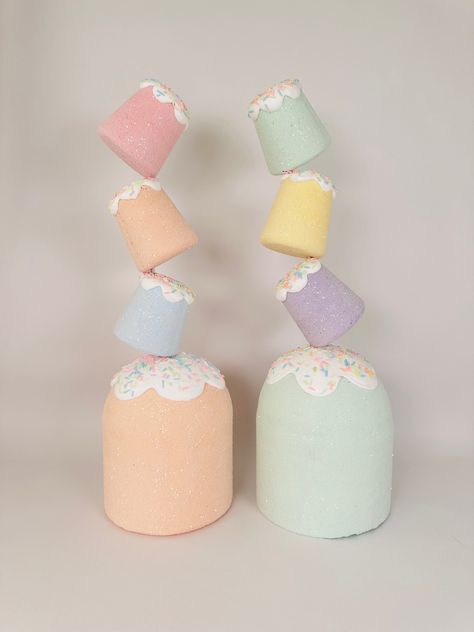 These delightful, jumbo sized fake gumdrops are perfect for adding a whimsical touch to any space. These oversized gumdrops are crafted from quality materials including foam clay. They come in an array of soft pastel colors, including pink, lavender, mint green, light blue, peach and yellow. Each gumdrop is topped with a playful dollop of faux frosting, colorful sprinkles, and a glittery cherry on top, making them look irresistibly charming.  These jumbo gumdrops are versatile decorative pieces. You can display them as standalone decorations on shelves or tables, incorporate them into festive centerpieces, for a magical holiday display. Lightweight yet sturdy, they offer a delightful and calorie-free way to add a touch of sweetness to your decor. Custom colors are also available upon reque Winter Candyland Decorations, Gumdrop Mountain Decorations, Candy Party Decorations Diy, Fake Candy Diy, Diy Gumdrops Decorations, Candy House Decorations, Candy Land Theme Christmas, Giant Candy Decorations Diy, Gumdrop Decorations