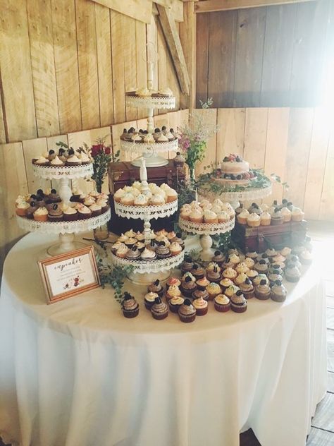 Cupcakes Table Decoration, Cupcakes Display Wedding, Mini Cupcake Table Display, Wedding Boho Cupcakes, Small Wedding Cake With Cupcakes Rustic, Cupcake Table Decor, Wedding Cake Table Ideas Display Cupcake Stands, Ways To Display Cupcakes At Wedding, Boho Wedding Cake And Cupcake Display