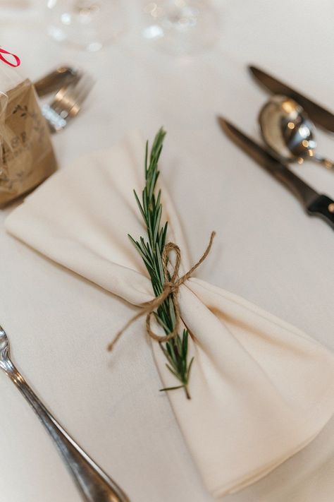 Aswanley Wedding Beth Sutton Photography Rosemary Twine Napkin #wedding #placesetting Rosemary Place Cards, Napkin With Rosemary, Winter Wedding Napkin Ideas, Napkins On Wedding Table, Rosemary Napkin Rings, Rosemary Table Setting, Rosemary Place Setting, Napkin Styles Wedding, Tied Napkins Place Settings