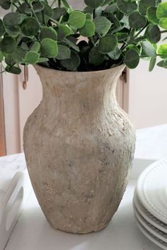 Do you love all those gorgeous stoneware vases popping up in all your favorite stores, but not the high prices? Me too. So I decided to create my own using a Dollar Store vase, drywall compound and paint! Pottery Barn is one of my go-to stores for home decor and inspiration. But sometimes those items I really adore are a bit out of my budget! Like these gorgeous vases I recently found! Earthenware has become so popular lately and there are DIY replica's all over Pinterest! Unfortuna… Spray Paint Vases, Stoneware Vases, Diy Painted Vases, Dollar Tree Vases, Paint Pottery, Diy Spray Paint, How To Make Decorations, Easy Diy Decor, Diy Pantry