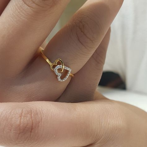 We put our hearts and souls into creating jewelry that will resonate with your spirit. Beautiful jewelry enhances the beauty of your soul. Add a touch of luxury to your life with our exquisite gold jewellery collection. Because you are worth it! 💛 Beautiful 14k Gold & diamond ring with GIA certified diamonds❤️ To order, DM us on Instagram or WhatsApp at 7339756707. Payment modes - Bank transfer, Paypal, Paytm, GPay, UPI, Cards, COD #instalike #instagram #reels#jewellery #jewellerylover ... Diamond Rings Heart, Beautiful Ring Designs, Heart Ring Design, Dimond Ring, Gold Jewellery Collection, Gold Thumb Rings, Cake Story, Fancy Diamond Ring, Gold Bracelet Simple