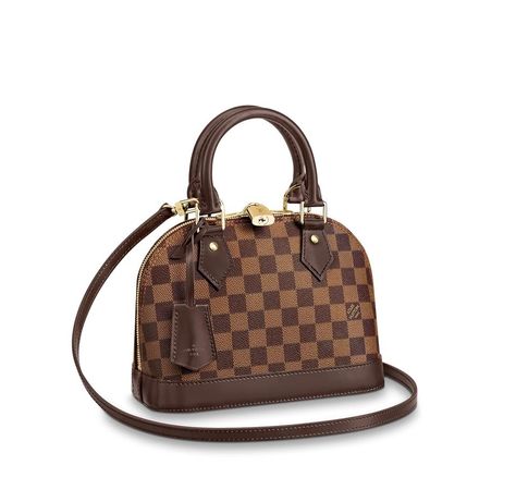 New & Vintage Louis Vuitton Up to 70% Off Retail. Real or Your Money Back. Shipping & Returns Included. The Alma BB handbag traces its pedigree to the Art Deco original, introduced in 1934. Signature details impart a timeless elegance to this model made from graphic Damier Ebene canvas: note the golden padlock and keys, twin Toron handles and chic leather key bell. Equipped with a removable strap, this charming small bag is perfect for cross-body wear. Detailed features 23.5 x 17.5 x 11.5 cm (Le Louis Vuitton Favorite Mm, Alma Bb, Chic Leather, Louis Vuitton Damier Ebene, Designer Handbag, Damier Ebene, Leather Key, Canvas Shoulder Bag, Lv Bag