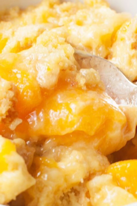 This crockpot peach cobbler is the perfect dessert to make in your slow cooker. Not only is this crockpot peach cobbler with cake mix fast and easy to make, it also only uses three ingredients. Peach Cobbler In Crock Pot Easy Recipes, Slow Cooker Cobbler, Sugar Free Peach Cobbler, Crockpot Cobbler, Cake Mix Peach Cobbler, Crockpot Peach Cobbler, Slow Cooker Cake, Cake Mix Cobbler, Crockpot Cake