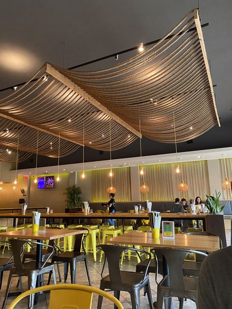 Celing Roof Design For Restaurant, Fabric Ceiling Bar, Cafe Ceiling Design Ideas, Open Ceiling Restaurant, Rope Ceiling Design, Bar Ceiling Ideas, Ceiling Design Cafe, Ceiling Design Restaurant, Restaurant Ceiling Ideas