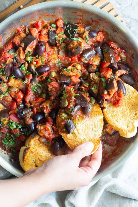 Eggplant caponata is an easy Sicilian appetizer that's full of flavor. It's vegan and you can serve it as a healthy dip with some crusty bread. It's a great addition to the dinner table and takes less than an hour to make. Serve caponata warm or cold, as an appetizer or a flavorful side dish! Italian Eggplant Recipes, Vegetarian Eggplant Recipes, Eggplant Caponata Recipe, Caponata Recipe, Eggplant Recipes Easy, Eggplant Caponata, Eggplant Recipe, Eggplant Dishes, Eggplant Parmesan