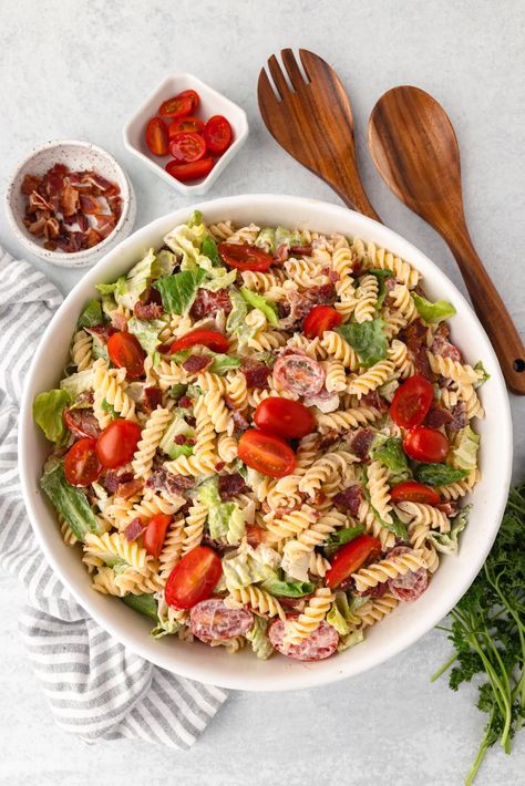 A large white bowl containing a blt pasta salad. It has bacon, romaine lettuce and grape tomatoes. Easy Blt Pasta Salad, Summer Potluck Dishes, Dishes For A Crowd, Blt Pasta Salad, Blt Pasta, Blt Pasta Salads, Summer Potluck, Potluck Dishes, White Bowl