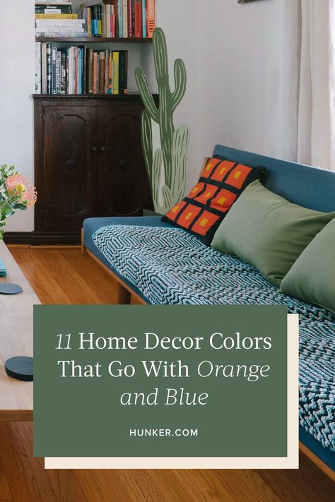 Blue Orange And Yellow Living Room, Blue Orange Color Palette Living Room, Blue Green Orange Home Decor, Orange And Blue Living Room, Blue And Orange Living Room, Terracotta Living Room, Blue Family Rooms, Light Blue Living Room, Orange Accent Chair