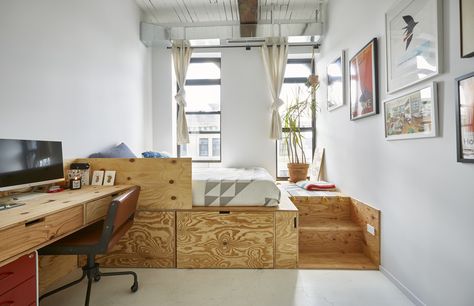 "The smaller room seconds as Sam’s office, with a plywood platform bed that has giant storage drawers underneath. I saw this design on Pinterest and we cobbled it together with our contractor and the cheapest possible wood we could find.” Credit: <a href="https://www.apartmenttherapy.com/authors/erin-derby">Erin Derby</a> Home Office With Bed, Jessica Bennett, Brooklyn Loft, Plywood Storage, Platform Bedroom, Platform Bed With Drawers, Plywood Interior, Japanese Room, Bed Platform