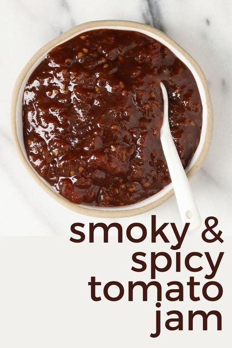 Smoky, Spicy, Tangy and just a little bit sweet, this Tomao Jam will be your favorite accompaniment to many things...your next cheese and cracker board, your next pizza, your next sandwich, and so many more. Recipe and instructions to water bath can. https://nourishandnestle.com/smoky-spiced-tomato-jam-recipe/ Spicy Tomato Jam Recipe Canning, Tomato Chilli Jam Recipe, Smoked Tomato Jam, Tomato Jalapeno Jam, Cowboy Tomato Jam, Tomato Jam Recipes, Savory Tomato Jam, Spicy Tomato Jam, High Acid Foods