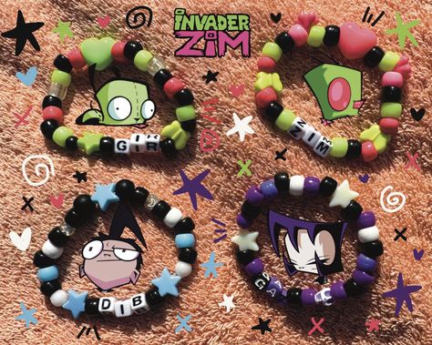 Kandi based on Invader Zim! Zim, Gir, Dib Membrane, and Gaz Membrane, as well as any other custom character!! PLUR (*'ω'*) Some of my kandi is one of a kind, as I recycle some beads from bracelets I purchase 2nd hand. I will probably redesign each bracelet as I run out of beads. Yours may look a little different than the pictures but will use the same colors! Order these as they are, or feel free to message about changing or adding colors/beads. Also feel free to DM about customs! Kandi is stretchy & will fit most wrists, please specify the size you'd like if needed. Kandi Invader Zim, Gir Bracelet Kandi, Beads On Safety Pins, Invader Zim Kandi Pattern, Domo Kandi Pattern, Gir Kandi Cuff, Invader Zim Bracelet, Gir Kandi Cuff Pattern, Gir Kandi Pattern