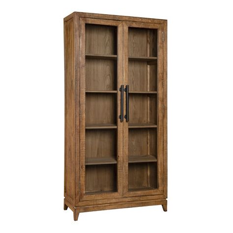 Showcase treasured books, decor, china and more in the substantial Britton storage cabinet. Made of antiqued pine wood with handforged metal handles and glass-paned doors revealing removable shelves, this grand display cabinet makes a striking addition to any room. A one-of-a-kind work of natural art with unique variations in color and grain pattern, its reclaimed-wood construction guarantees that no two pieces are alike. Boho Jewelry Display, Victorian Library, Wooden Armoire, Dining Room Updates, Glass Display Cabinet, Books Decor, Removable Shelves, Glass Cabinets Display, Cabinet Shelving