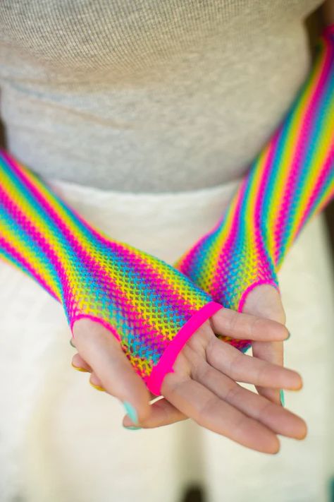 Bright neon colors form a truly eye-catching rainbow in these pink-trimmed fishnet arm warmers, perfect for pride! Arm Fishnets, Fishnet Arm Warmers, Mai Cosplay, Arm Stretches, Beetlejuice Halloween, Scene Outfits, Clown Costume, Funky Outfits, Fishnet Tights