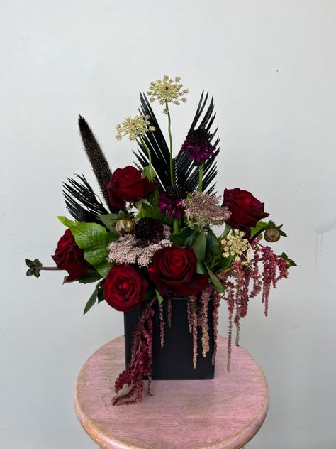 dark red roses, black greens and crodile fern. dark yet fashionable #floral #gothflowers Goth Flower Arrangements, Black Rose Flower Arrangements, Gothic Flower Arrangements, Dark Moody Flower Arrangements, Dark Floral Arrangements, Dark And Moody Floral Arrangements, Dark Red Floral Arrangements, Gothic Dried Flower Arrangement, Vampire Birthday