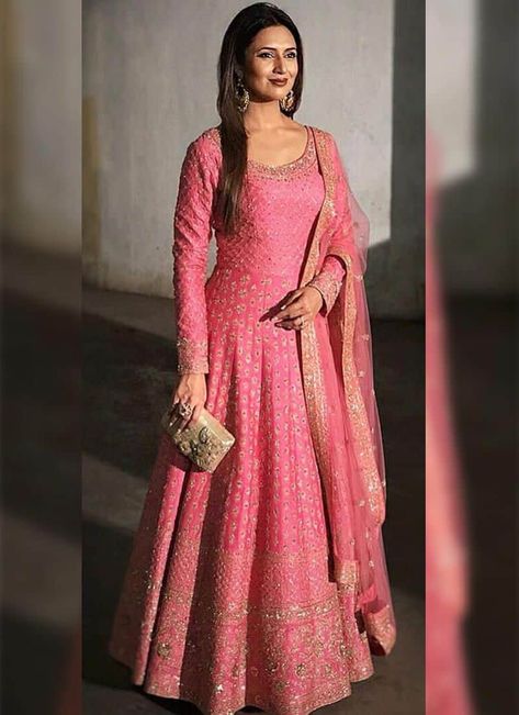 Pink Zari Sequins Raw Silk Festive Floor Legth Anarkali Suit. Shape: Anarkali Suit, Floor Length Salwar Suit Color :- Pink Work Details :- Sequins, Zari Sleeves :- 3/4 Sleeves Pattern :- Print Neck :- Round Neck Fit:- Regular Floor Length - Salwar Suit Fabric - Raw Silk Stitching Type - Semi Stitched Wash Care:- Dry Clean Only ----------------------------------------------------------------- The floor-length Anarkali suit is custom-made to fit your body type. The zari and sequin details on the r Party Wear Long Gowns, Pink Anarkali Suits, Silk Anarkali Suits, Pink Anarkali, Pengantin India, Kurti Style, Silk Anarkali, Indian Party Wear, Indian Gowns Dresses