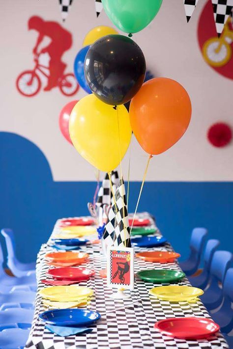 BMX Birthday Party Ideas | Photo 3 of 17 | Catch My Party Bmx Birthday Party Decoration, Bmx Party Ideas, Bmx Themed Birthday Party, Bmx Birthday Party Ideas, Bike Party Ideas For Kids, Kids Bike Party, Bmx Birthday Party, Bicycle Birthday Parties, Checkered Table Cloth