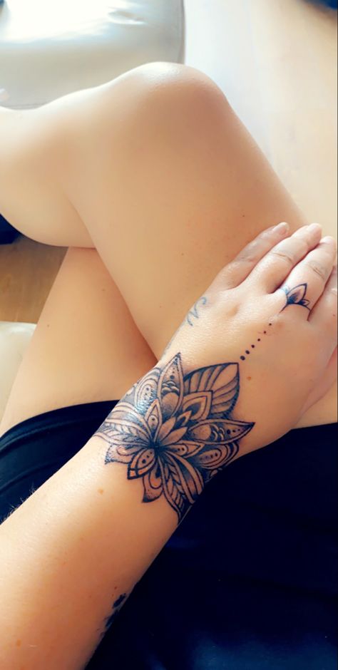 Butterfly Cuff Tattoo, Lotus Tattoo On Wrist, Lotus Flower Hand Tattoos For Women, Feather Wrist Tattoos For Women, Lotus Flower Tattoo Hand, Hand Cuff Tattoo, Lotus Flower Hand Tattoo, Lotus Hand Tattoo, Ankh Tattoos