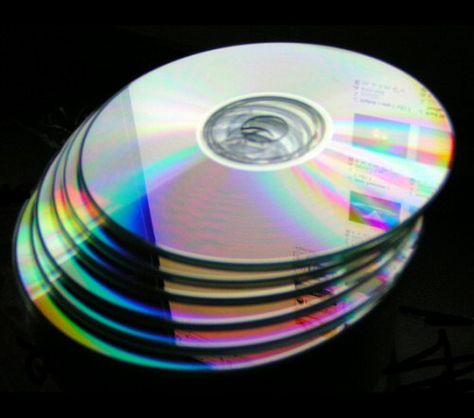 How to recycle your unwanted or damaged CDs, DVDs and CD-Roms. #recycling #CDrecycling #DVDrecycling Cd Illustration, Osc Oc, Cd Photography, Taco Bell Logo, Dj Pon3, Homescreen Organization, Metal Photography, Old Cd Crafts, Dvd Art