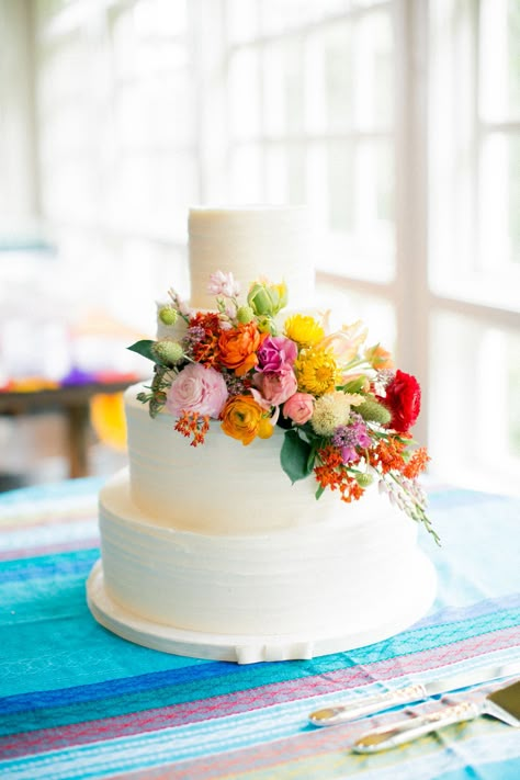 White Cake With Bright Flowers, White Wedding Cake With Colorful Flowers, Wedding Cake Bright Flowers, Wedding Cake Colorful Flowers, Cascading Flower Cake, Cakes With Real Flowers, Werewolf Wedding, Color Wedding Cake, Cake With Real Flowers