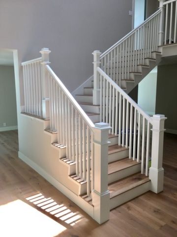 All White painted stair railing clean lines Stair Railing Ideas, Indoor Railing, Entryway Decorating, Wood Balusters, White Stairs, Stair Balusters, Stair Gallery, Home Entryway, Stylish Bedroom Design