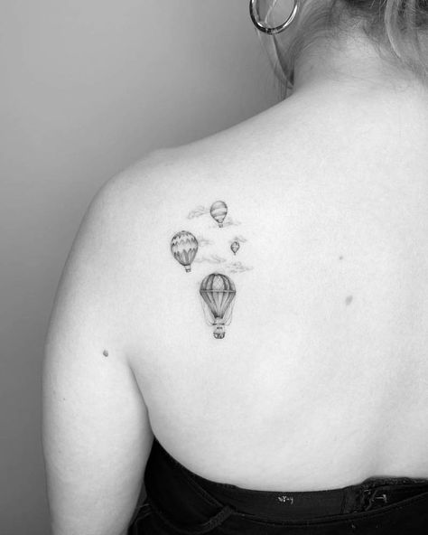 Single needle hot air balloons tattooed on the shoulder Vintage Hot Air Balloon Tattoo, Airbaloon Tattoo, Hot Air Balloon Tattoos, Small Hot Air Balloon Tattoo, Balloons Tattoo, Night Sky Tattoos, Adorable Tattoos, Hot Air Balloon Tattoo, Air Balloon Tattoo