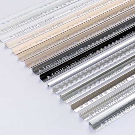 Round 12mm Aluminium Tile Trim Bright SilverEver popular round edge anodised aluminium tile trim. Easy to use providing a neat finish for tiled windows, doorways, corners and arches.Suitable for tiles up to 12mm thick. • View all of our 12mm Tile Trims Brass Tile, Easy Tile, Easy Bathrooms, Copper Tiles, Pvc Trim, Edge Profile, Tile Edge, Tile Trim, Flooring Materials