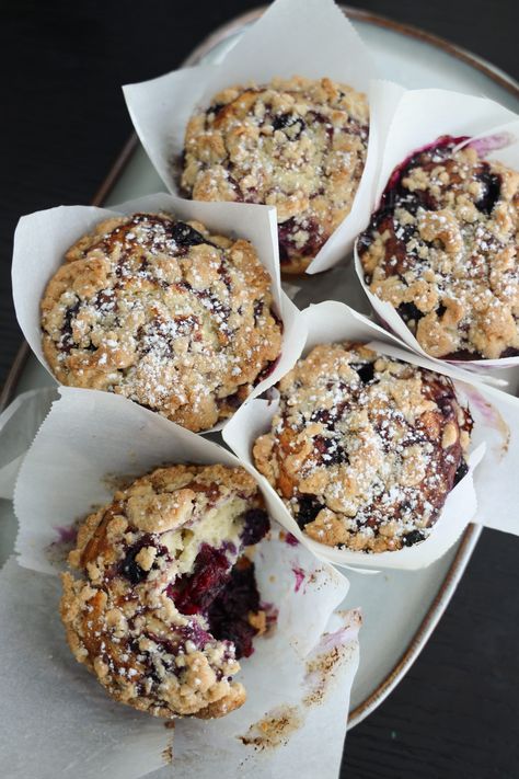 Nothing better than a warm crumbly muffin with pockets of berries compote through out. These Berry Cobbler Muffins is an ode to my childhood. Blackberry Cobbler Cupcake, Mixed Berry Muffins With Crumb Topping, Berry Crumble Muffins, Comfort Baked Goods, Mulberry Muffins Recipe, Mixed Berry Muffins With Frozen Berries, Marionberry Muffins, Gourmet Muffins Recipes, Berry Muffins With Frozen Berries