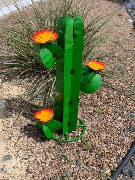 PRICES MAY VARY. 100% HANDMADE - This cactus saguaro will brighten any space you place it. It has a circular base which can be buried underground, making it appear as if it has grown from the ground. They are all handmade, so each plant will be slightly different. No need to assemble it - Simply place this cactus anywhere you like, it makes a great addition to your garden, yard, pond, and lawn. This cactus plant is made out of high-quality metal, it has been coated to protect it from rusting. En Wooden Garden Art, Yard Pond, Rusty Metal Garden Art, Front Flower Beds, Unique Garden Art, Cactus Decor, Metal Garden Art, Stained Glass Diy, Cactus Plant