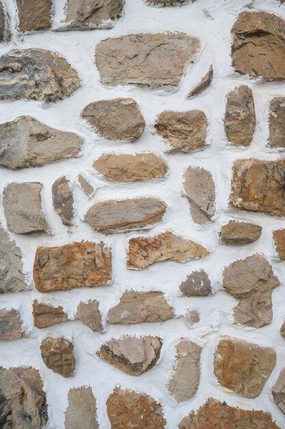 Wall texture with stones and white cemen... | Premium Photo #Freepik #photo #plaster-wall #white-grunge #stone-wall #rough-texture Rough Stone Texture, Grey Stone Wall Texture, White Wall Texture, Dark Wood Texture, Grey Stone Wall, Stone Wall Texture, Concrete Wall Texture, Door Texture, European Holiday