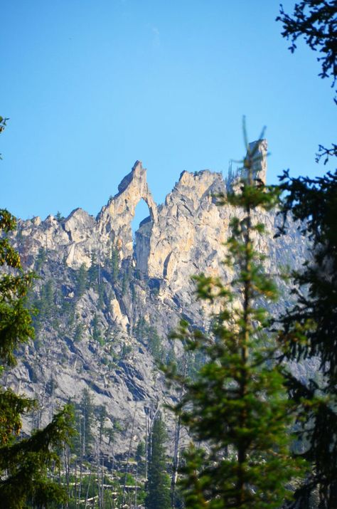 Bitterroot Valley of Montana Iconic Blodgett Arch, which is all granite and formed from glaciers receding over 1000 years ago.  An amazing 3 mile hike into the wilderness from Hamilton, Montana Bitterroot Mountains, Hamilton Montana, Montana Hiking, Howling Coyote, Western Montana, Montana Mountains, Montana Vacation, Montana Travel, Montana Homes