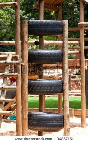 jungle gym, made of somewhat used tires. I had a really sweet one back in grade school, it was "HUGE" with slides and tunnels, I definitely intend on re-creating one like it for my backyard Kids Jungle Gym, Diy Playground, Kids Outdoor Play, Tyres Recycle, Natural Playground, Jungle Gym, Outdoor Gym, Backyard Playground, Backyard Play