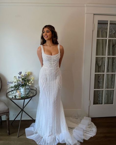 We love this intricate beaded gown that hugs every curve perfectly. ⁠ ⁠ "Jolene" Dana Harel ⁠— book an appointment and try her on. ⁠ ⁠ Schedule at one of our #DressTheory locations.⁠ #Nashville #Seattle #SanDiego.⁠ ⁠ Click the link in bio.⁠ ⁠ #dresstheory #realdresstheorybrides #weddingdressstyling #bridalstyleinspiration #modernbride⁠ #bridalgown Timeless Beaded Wedding Dress, Dana Harel Bridal Jolene, Fit And Flare Wedding Dress Black Women, Creamy White Wedding Dress, Dana Harel Jolene, Wedding Dresses Pearl Straps, Beaded Reception Wedding Dress, Unique Beaded Wedding Dress, Wedding Dresses Garden Outdoor