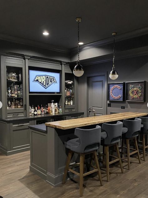 25 Basement Bar Ideas You Should Try Bar Ideas For Garage Man Cave, Basement L Shaped Bar Ideas, Basement Bourbon Bar Ideas, Bar Room Ideas In House Luxury, Basement Bar Designs Layout, Black Basement, Basement Wet Bar Ideas, Small Basement Bar, Modern Basement Bar