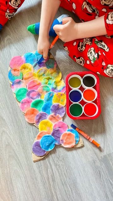 Baker Ross on Instagram: "🧜‍♀️ Amazing mermaid tail! 🧜‍♀️ We love this technique by @create_make_and_play using cotton pads to create an almost tie dye effect. Its also a great way to upcycle some spare cardboard. Do you have any craft plans for the summer holidays? 😎 #bakerross #getkidscrafting #mermaid #tiedye" Little Mermaid Crafts, Mermaid Craft, Mermaid Party Games, Craft Cardboard, Toddler Party Games, Toddler Sensory Bins, Mermaid Tails For Kids, Mermaid Kids, Holiday Activities For Kids