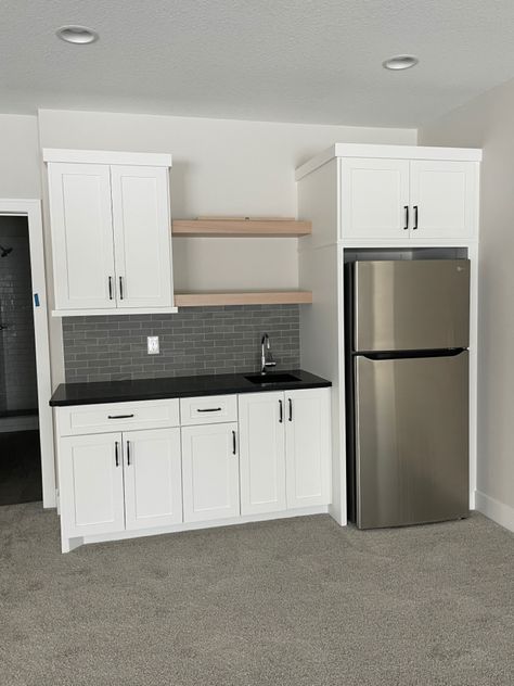 Turn Garage Into Living Space Family Rooms, Kitchenette With Refrigerator, Basement Kitchenette Full Fridge, Kitchenette Full Size Fridge, Coastal Kitchenette Ideas, Black And White Kitchenette, Kitchenette Ideas Office, Small Mother In Law Suite Kitchenettes, Open Shelving Kitchenette